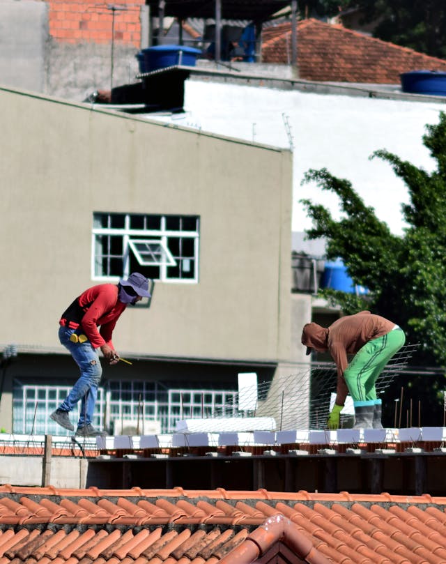 Men repairing roof